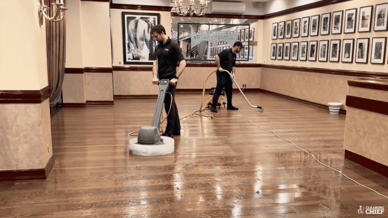 Hardwood floor buffing in NYC Restaurant with commercial buffer to clean and wax the floors