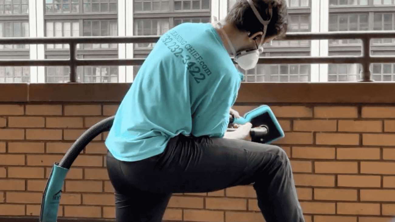 Power washing of the tiles and grout with pressure washing machine in new york