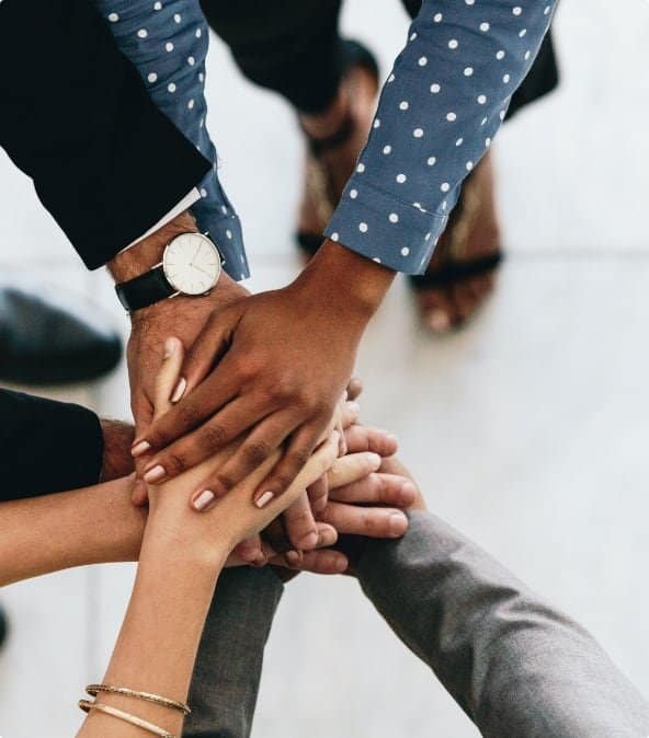 Diverse team stacking hands, teamwork, trust, collaboration, corporate unity, success, business, partnership, diversity, teamwork power.