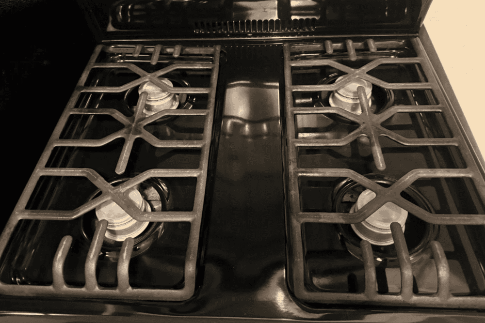 Shiny clean stovetop after professional kitchen degreasing and cleaning service